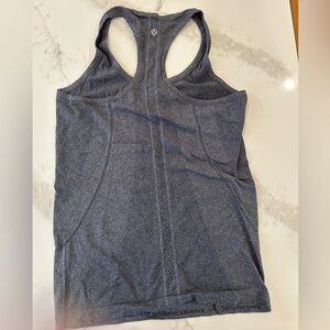 Dark great. Lululemon razorback tank top. Size 4.
